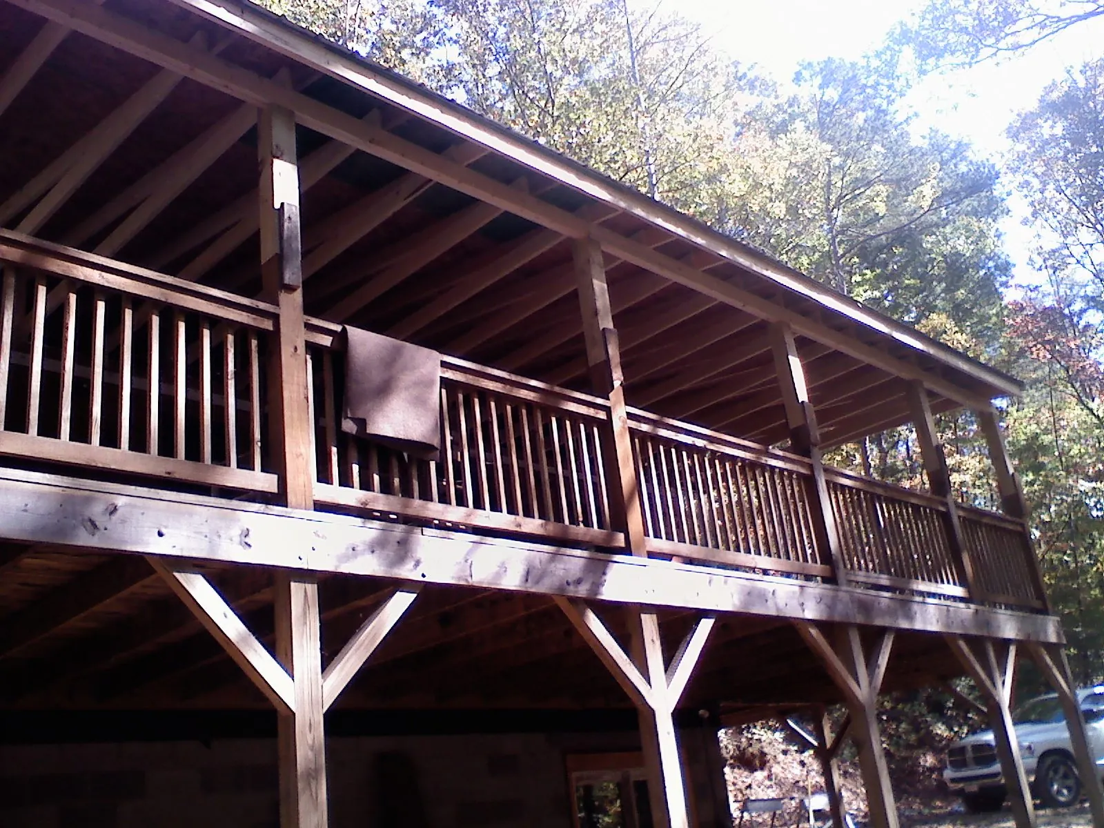Timber framing under a new elevated porch and deck — Roof Leak Repair in Lowellville by Roofing Brothers